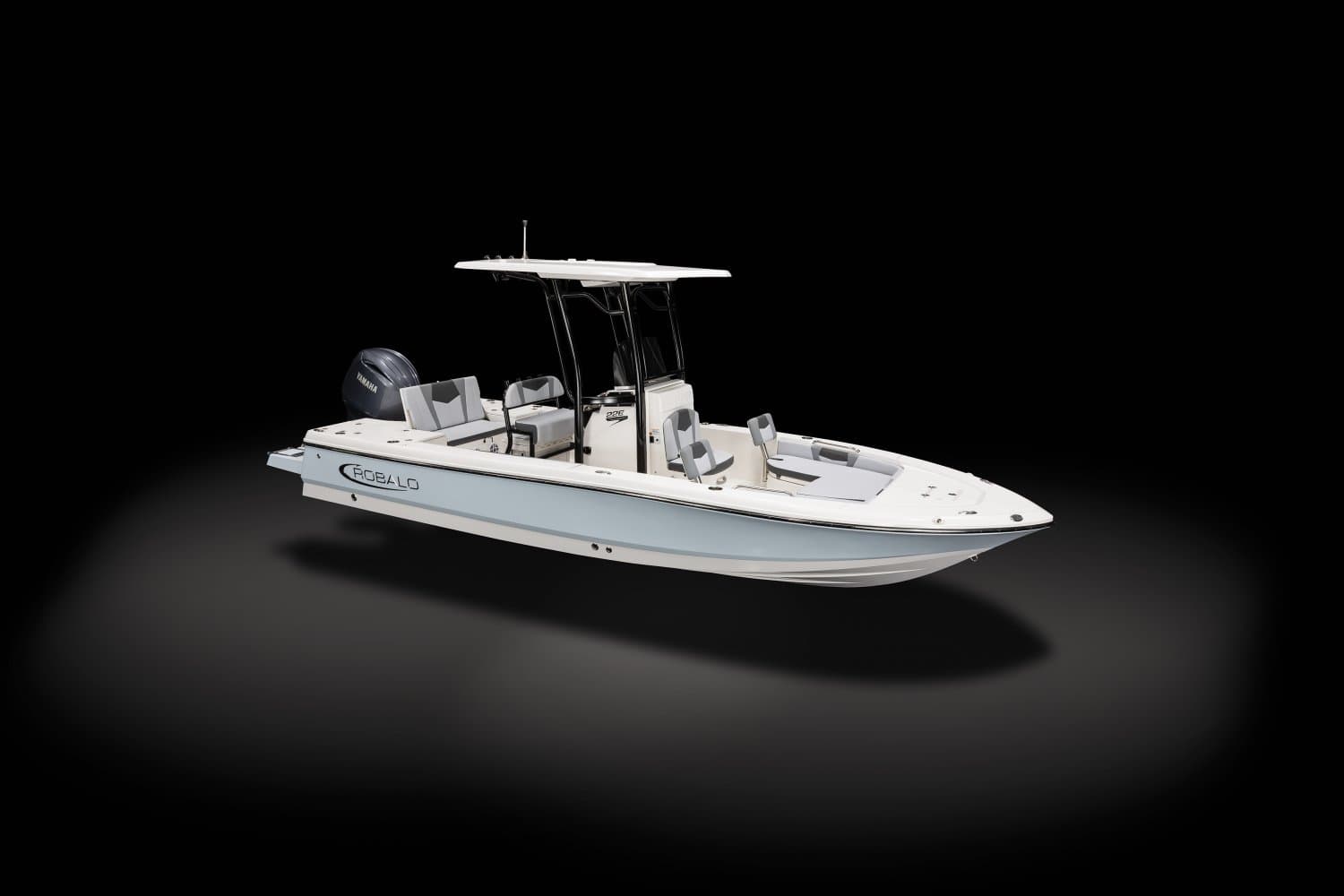 Robalo 226 Cayman bay boat on a black studio background — forward three-quarter view from the starboard side, showing the bow casting deck, console seating and T-top.