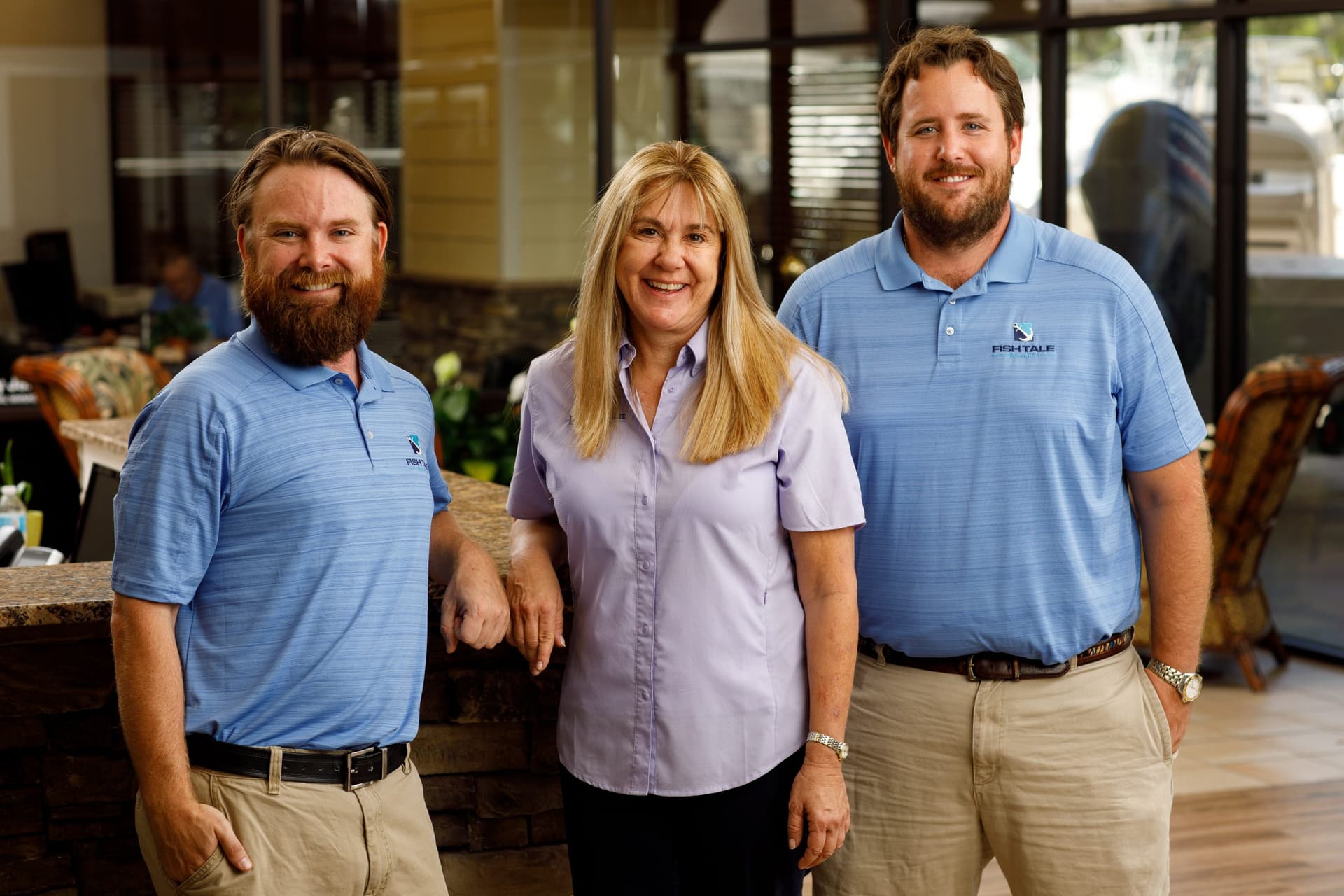 Diane, Travis, and Justin Fricke — the family behind Fish Tale Boats